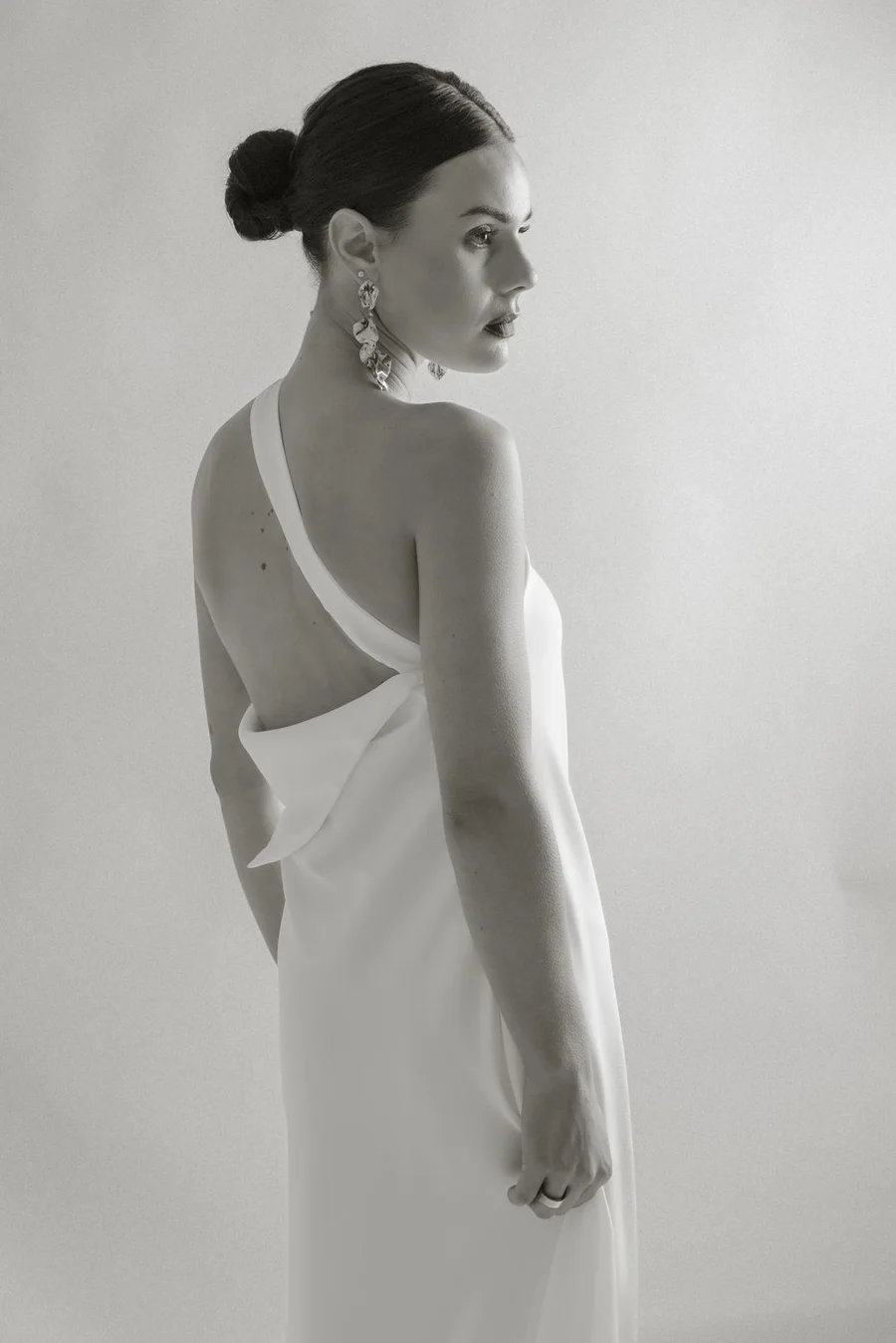 Studio portrait of a Sarah Stoute 2025 collection wedding gown